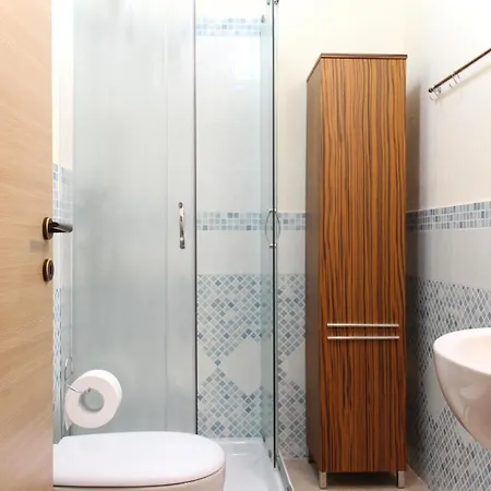 Апартаменты Acquachiara Giardino E Posto Auto Privato *